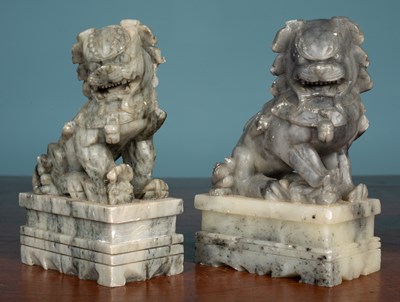 Lot 263 - Two Oriental soapstone dogs of fo