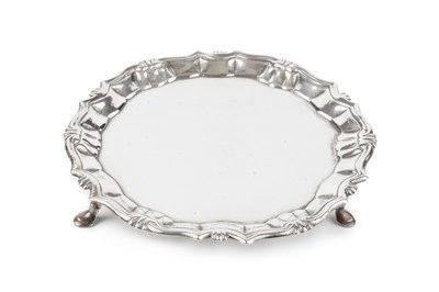 Lot 842 - A George II silver waiter, with piecrust...