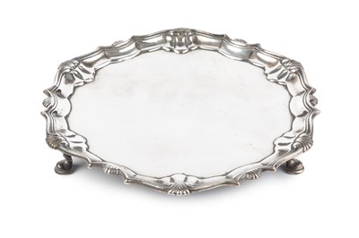 Lot 843 - A George II silver salver, with shaped...