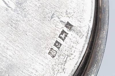 Lot 844 - A silver circular tray, with beaded border and...