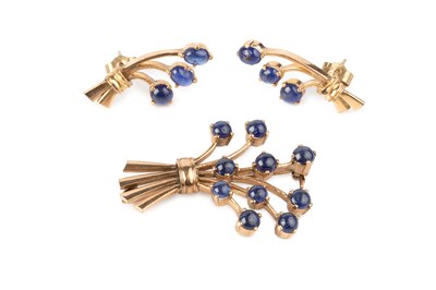 Lot 101 - A sapphire brooch and ear studs suite, each...