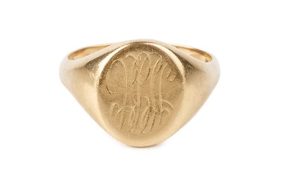 Lot 8 - An 18ct gold signet ring, the oval panel with...