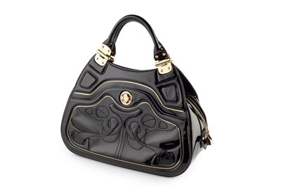 Lot 144 - A black patent handbag by Alexander McQueen,...