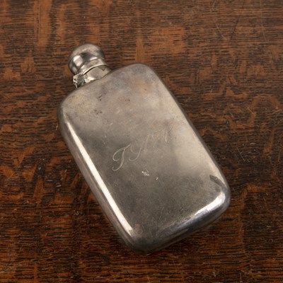 Lot 270 - Silver hip flask of plain form, one side...