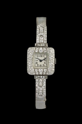 Lot 145 - A diamond cocktail watch, the square silvered...