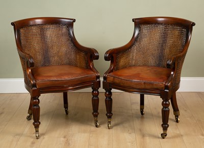 Lot 435 - A pair of William IV style caned bergeres