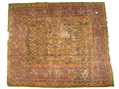 Lot 9 - A late 19th/early 20th century Turkish rug
