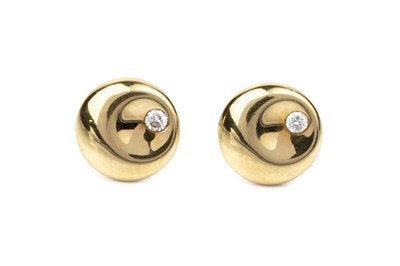 Lot 156 - A pair of diamond set ear studs designed by...