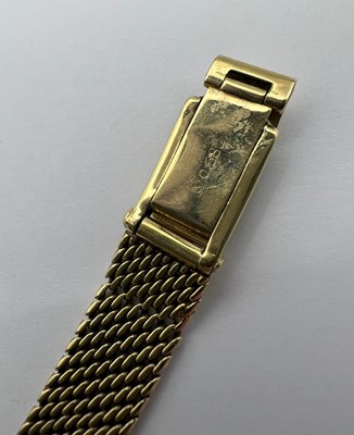 Lot 194 - A yellow precious metal bracelet watch, the...