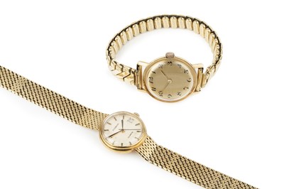 Lot 194 - A yellow precious metal bracelet watch, the...