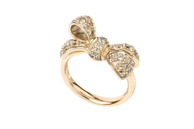 Lot 155 - A diamond set 'Forever' bow ring by Pomellato,...