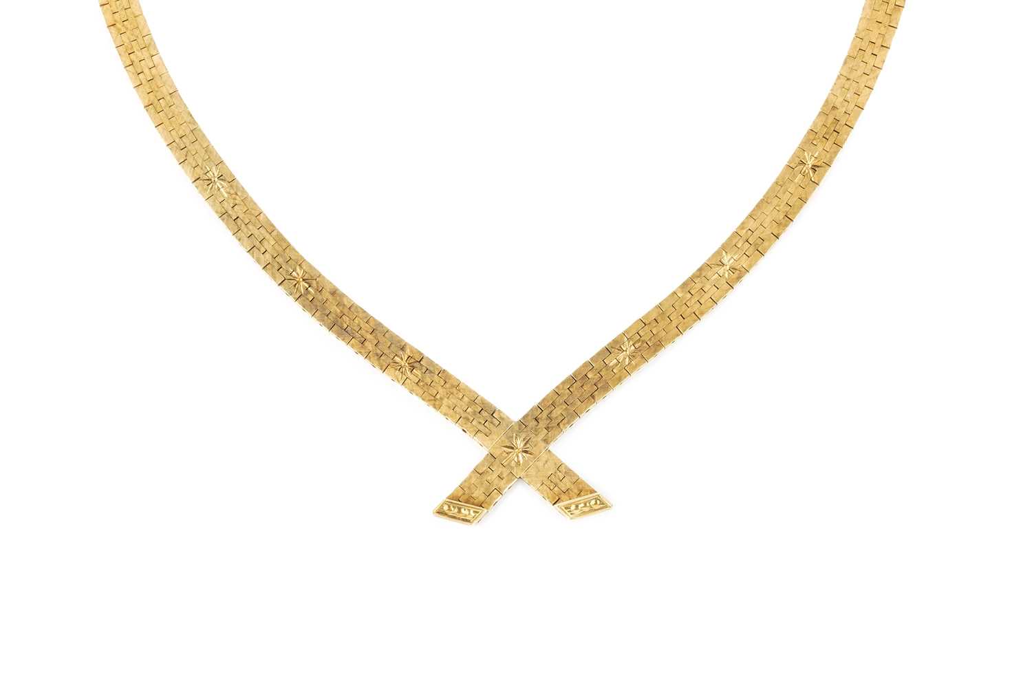 Lot 132 - A yellow precious metal collar necklace, of...