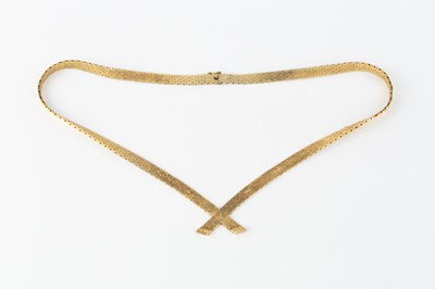 Lot 132 - A yellow precious metal collar necklace, of...