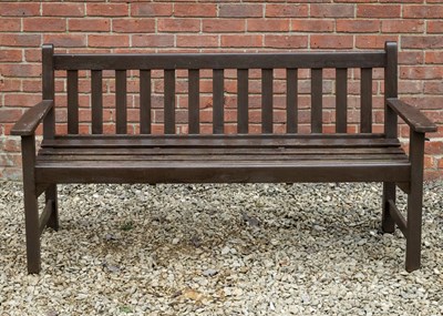 Lot 1207 - A stained teak garden bench