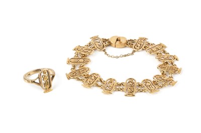 Lot 220 - A yellow precious metal fancy-link bracelet,...