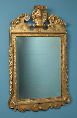 Lot 23 - A George II style carved gilt wall mirror