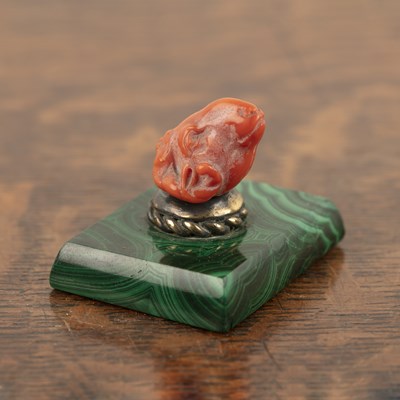 Lot 278 - Carved coral ram's head desk paperweight...