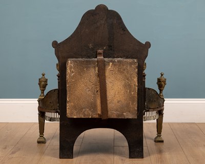 Lot 1129 - A Georgian style fire grate