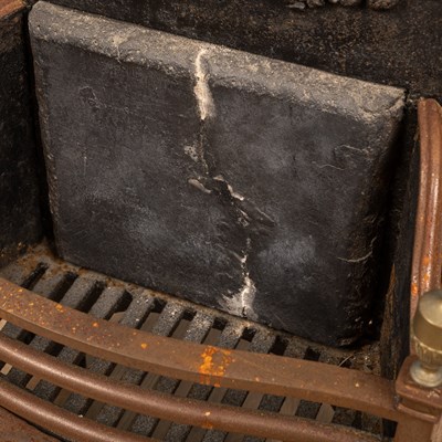 Lot 1129 - A Georgian style fire grate