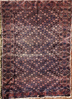 Lot 35 - A group of three antique rugs