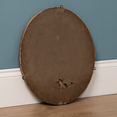 Lot 40 - An antique small oval wall mirror
