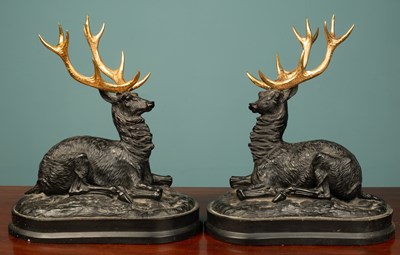 Lot 144 - A pair of bronze stag sculptures