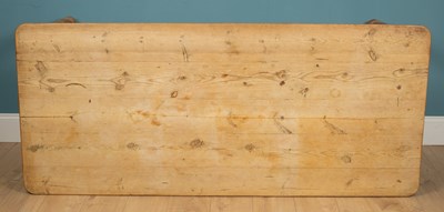 Lot 26 - A large pine kitchen table
