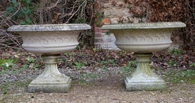 Lot 1085 - A pair of Haddonstone garden urns