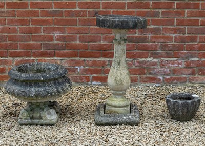 Lot 1190 - A cast reconstituted stone urn, a bird bath and a small planter