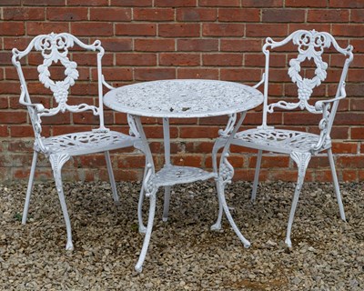 Lot 1134 - A white painted cast aluminium circular table and a pair of chairs