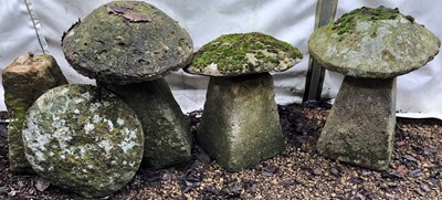 Lot 1202 - A group of four various sandstone staddle stones