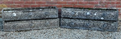 Lot 1234 - A set of four cast reconstituted stone troughs