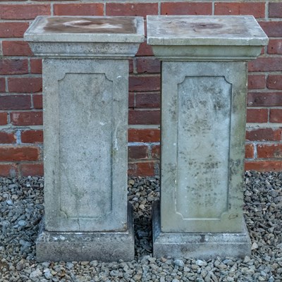 Lot 1168 - A pair of square section Haddonstone plinths