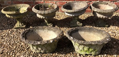 Lot 1216 - A pair of oval cast reconstituted stone planters and four various cast reconstituted stone urns