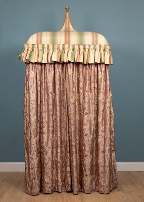 Lot 127 - A decorative curtain-hung wardrobe