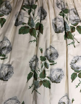 Lot 384 - A long pair of curtains, a pair of shorter curtains and a pelmet