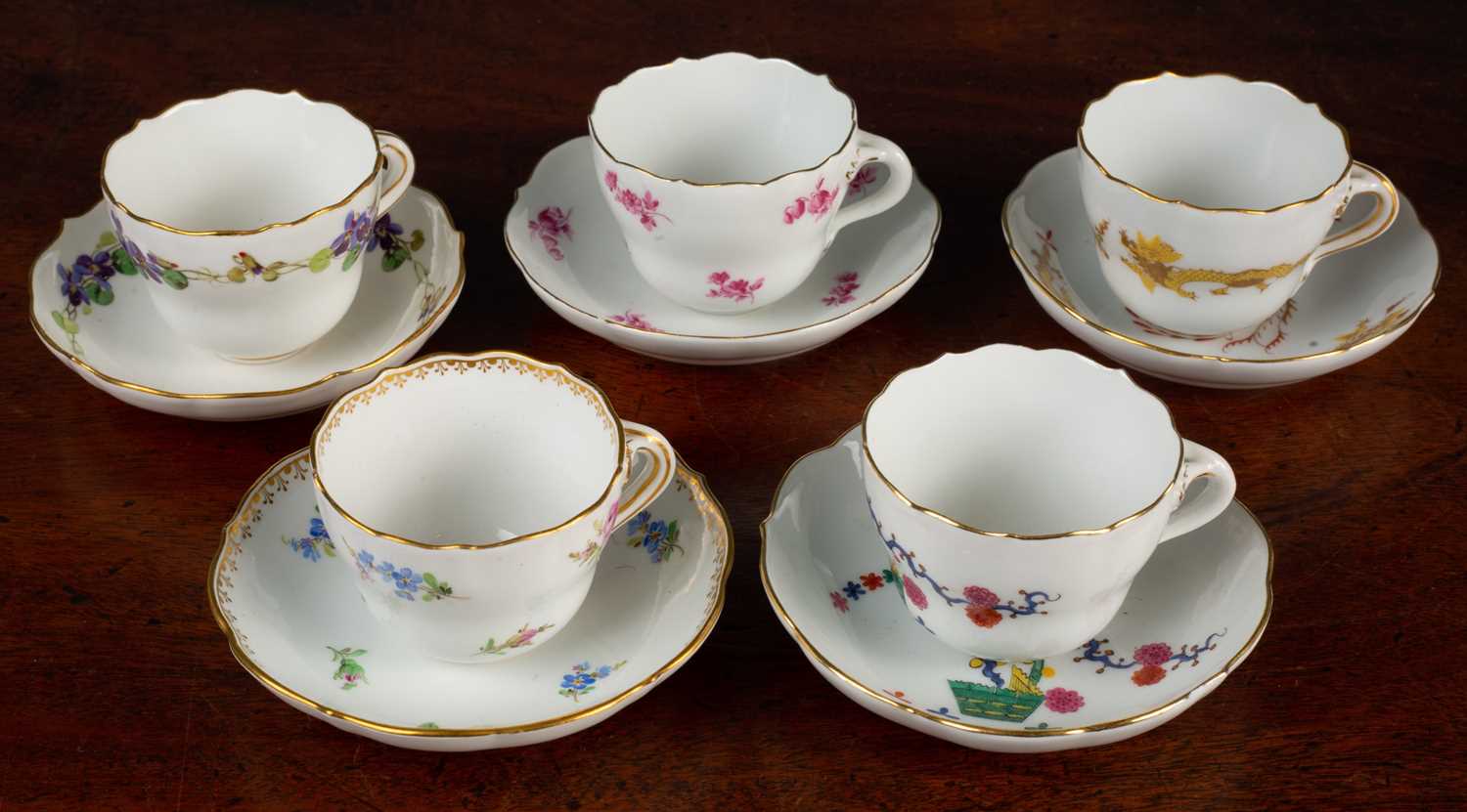 Lot 26 - Five Meissen miniature cups and saucers