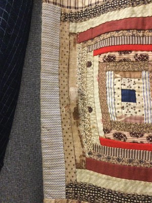 Lot 157 - A late Victorian patchwork quilt with rows of...