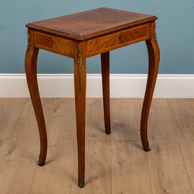 Lot 177 - A French kingwood veneered occasional table