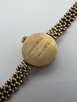 Lot 192 - A lady's 9ct gold bracelet watch by Roamer,...