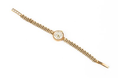 Lot 192 - A lady's 9ct gold bracelet watch by Roamer,...