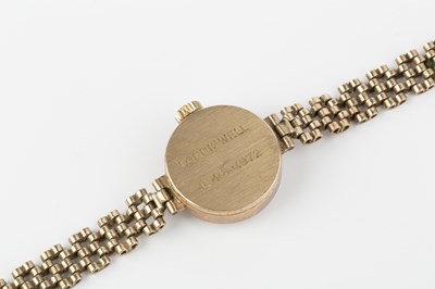 Lot 192 - A lady's 9ct gold bracelet watch by Roamer,...