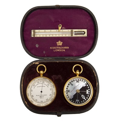 Lot 42 - A cased pocket barometer, compass and...