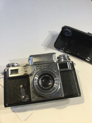 Lot 57 - Three Zeiss Ikon Contax cameras with lens...