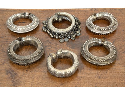 Lot 496 - Six white metal anklets Omani, 20th Century of...