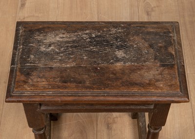 Lot 530 - An antique oak joint stool