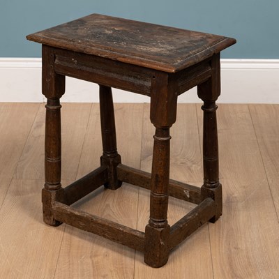 Lot 530 - An antique oak joint stool