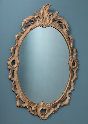 Lot 139 - A Rococo-style modern composite framed wall mirror