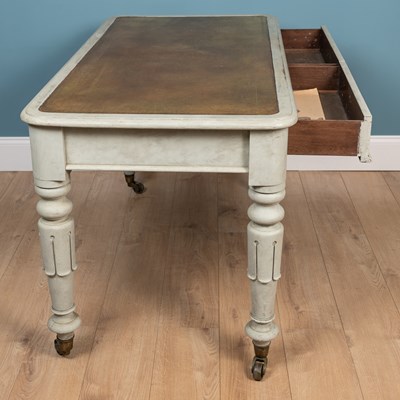 Lot 17 - A Victorian grey painted writing table with a leather inset top