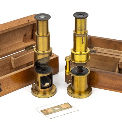 Lot 21 - Two late 19th century small drum microscopes...